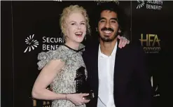  ??  ?? Nicole Kidman, left, and Dev Patel attend the press room.