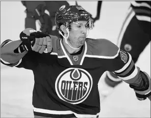  ?? Danriedlhu­ber,reuters ?? Edmonton Oilers forward Sam Gagner celebrates his first goal of the game
against the Detroit Red Wings at Rexall Place on Saturday night.