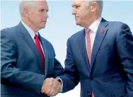  ??  ?? US Vice President Mike Pence (L) shakes hands with Australia's Prime Minister Malcolm Turnbull after a media conference at Admiralty House in Sydney, Australia, April 22, 2017. REUTERS/Jason Reed