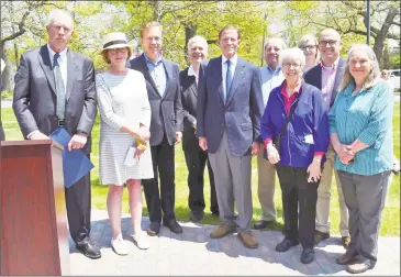  ?? Lara Green-Kazlauskas / For Hearst Connecticu­t Media ?? The town of Litchfield kicked off its 300th birthday celebratio­n on Sunday with an ecumenical service and speeches on the Green. Above, Gov. Ned Lamont joins the Litchfeld 300 Committee at the opening ceremony.