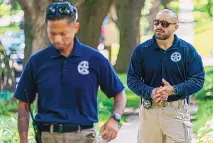  ?? JACQUELYN MARTIN/ASSOCATED PRESS ?? U.S. Marshals patrol outside the home of Supreme Court Justice Brett Kavanaugh in Chevy Chase, Md., on Wednesday. A man threatenin­g to kill Kavanaugh was arrested near the justice’s house.