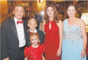  ?? Photos by Pam Cress, Special to The Denver Post ?? From left, Colorado Ballet’s artistic director, Gil Boggs; their son Corey; daughter, 2017 Sugarplum Emma Taylor Boggs; Boggs’ wife, Sandra Brown; and Sugarplum Ball chairwoman Katy Brown.