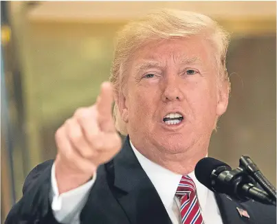  ?? Picture: Getty. ?? President Trump fielded questions from reporters about his comments on the events in Charlottes­ville on Saturday when he said there was “blame on both sides”.