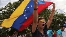  ??  ?? Opponents of Venezuelan President Nicolas Maduro protest the previous day’s presidenti­al election which Maduro won, in Caracas. AP PhoTo/FernAndo LLAno