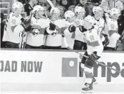  ?? NAM Y. HUH/AP ?? Panthers center Jayce Hawryluk celebrates with teammates after scoring against the Blackhawks in Chicago.