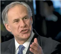  ?? REUTERS ?? Texas Governor Greg Abbott has been criticised for joking about shooting journalist­s when signing new firearms legislatio­n.