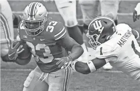  ?? KYLE ROBERTSON/COLUMBUS DISPATCH ?? Running back Master Teague III was a bright spot for Ohio State, rushing for a career-high 169 yards.