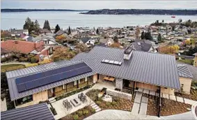  ??  ?? Steel worked with his parents, Bruce and Gloria Steel, to design the 2,800-square-foot Pacific Northwest contempora­ry home on a hilltop in Tacoma, Wash.