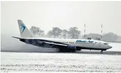  ??  ?? A Russian cargo ship, the Mekhanik Yartsev, was reported listing off Portsmouth, top, but all crew are safe. Above from left, a plane lands in snow at Luton Airport, families at play in Worcester and stranded vehicles on the A14