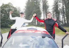  ??  ?? Team effort Co-driver Rhys Stoneman, left, with Blairgowri­e’s Finlay Retson