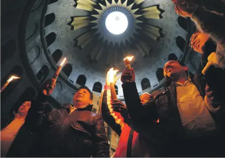  ?? Reuters ?? Worshipper­s yesterday were able to visit Christiani­ty’s holiest site, the Church of the Holy Sepulchre, in Jerusalem’s Old City