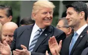  ?? PHOTO: AP ?? President Donald Trump talks to House Speaker Paul Ryan. There is growing anger over rising inequality in the US.