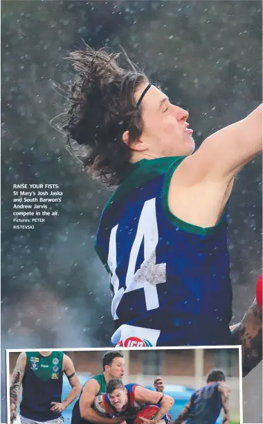  ?? Pictures: PETER RISTEVSKI ?? RAISE YOUR FISTS: St Mary’s Josh Jaska and South Barwon’s Andrew Jarvis compete in the air.