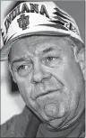  ?? AP PHOTO ?? In this 1996 file photo, Indiana football coach Bill Mallory speaks at a news conference in Bloomingto­n, Ind., after he was fired. Mallory, the winningest football coach in Indiana history who also led three other schools to bowl games, has died from a...