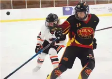  ?? REGINA REBELS ?? Larissa Bohlken, right, scored in overtime on Wednesday to give the Regina Rebels a 3-2 victory over the Swift Current Diamond Energy Wildcats and clinch their semifinal series.