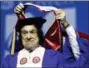  ?? MARY SCHWALM — ASSOCIATED PRESS FILE ?? In a 2010 photo, author Richard Goodwin receives a Doctor of Humane Letters honorary degree from Trustee Edward Collins during commenceme­nt ceremonies at UMassLowel­l at the Tsongas Center in Lowell, Mass.