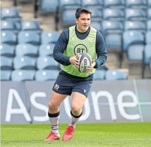  ??  ?? KICKING ON: Sam Johnson training with the Scotland squad and, below, James Lang.