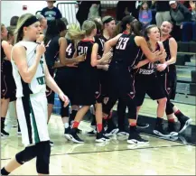  ?? LARRY GREESON / For the Calhoun Times ?? Sonoravill­e players celebrate with teammate Cortney Williams (10) after her game-winning shot on Monday.