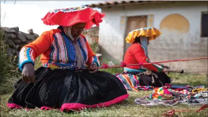  ?? Picture: Dan Kitwood/getty ?? „ Women in remote Andes communitie­s of Peru weave material using techniques that go back 5,000 years. Many Quechua women have little access to education or work. Social enterprise Threads of Peru helps bring their product to market.