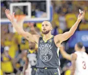  ??  ?? Golden State Warriors guard Stephen Curry made an NBA Finals-record nine 3-pointers against the Cleveland Cavaliers in Game 2 on Sunday night in Oakland, Calif.