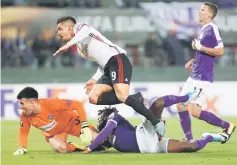  ??  ?? AC Milan’s Andre Silva (top left) scores the second goal during the UEFA Europa League group D football match against Austria Wien in Vienna, Austria. — Reuters photo