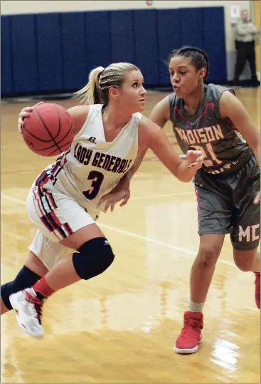  ??  ?? Heritage senior Tory Harvey tries to dribble past Madison Coiunty’s Bethany Fortson during Friday’s Class AAAA state playoff opener in Ringgold. The visiting Red Raiders pulled the 48-45 upset, ending the Lady Generals’ season with a 25-4 record....