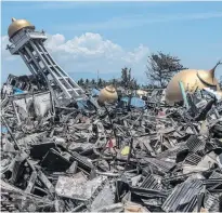  ?? PHOTO: GETTY IMAGES ?? Ruined . . . Rubble and debris lie around the ruins of a mosque in Palu.