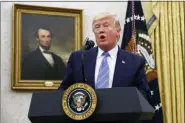  ?? CAROLYN KASTER - THE ASSOCIATED PRESS ?? President Donald Trump speaks during a ceremony in the Oval Office of the White House where Mark Esper is sworn in as the Secretary of Defense in Washington, Tuesday.