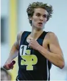  ?? TERRANCE WILLIAMS/FOR BALTIMORE SUN MEDIA ?? Severna Park’s Liam Hagerty runs in the 4x800-meter relay at the Class 4A indoor track and field state championsh­ips at the Prince George’s Sports & Learning Complex in Landover on Wednesday.