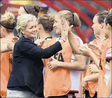  ?? Carmen Jaspersen
European Pressphoto Agency ?? COACH SILVIA NEID and her players celebrate Germany’s opening goal against Ivory Coast in the 2015 Women’s World Cup.