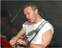  ?? GETTY IMAGES ?? When Chris Martin streamed a gig on his cellphone it brought comfort to many fans.