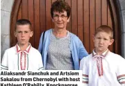  ??  ?? Aliaksandr Sianchuk and Artsiom Sakalou from Chernobyl with host Kathleen O’Rahilly, Knocknagre­e