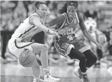  ?? / USA TODAY SPORTS ?? Connecticu­t guard Saniya Chong plays harassing defense against UCLA’s Jordin Canada on Saturday.