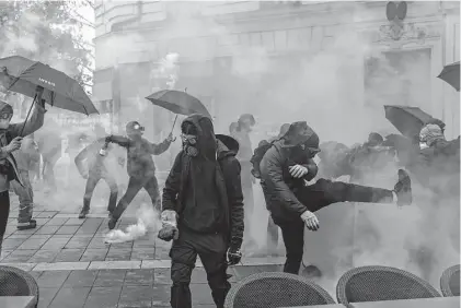  ?? Jeremias Gonzalez/Associated Press ?? Opponents of President Emmanuel Macron’s hotly contested plan to raise the retirement age from 62 to 64 took to the streets of France on Saturday for the second time last week in what unions hope will be a new show of force.