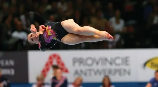  ?? VIRGINIA MAYO, THE ASSOCIATED PRESS ?? Victoria Moors lands one of the moves named after her during the floor exercise competitio­n at the 2013 world championsh­ips.