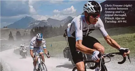  ?? AFP PIC ?? Chris Froome (right) in action between Annecy and Le Grand-Bornand, French Alps on Tuesday.