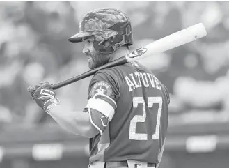  ?? John Bazemore / Associated Press ?? Astros second baseman Jose Altuve is batting .412 and hit his second home run of the spring on Wednesday. Altuve said he is ‘‘really close” to being ready.