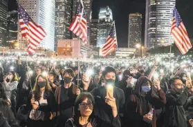  ?? Lam Yik Fei / New York Times ?? Protesters turn out to support legislatio­n in the United States requiring American officials to assess Hong Kong’s autonomy from mainland China.