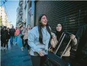  ?? CAN OZER/AP ?? Terrified pedestrian­s flee a popular thoroughfa­re after an explosion killed at least six people in Istanbul.