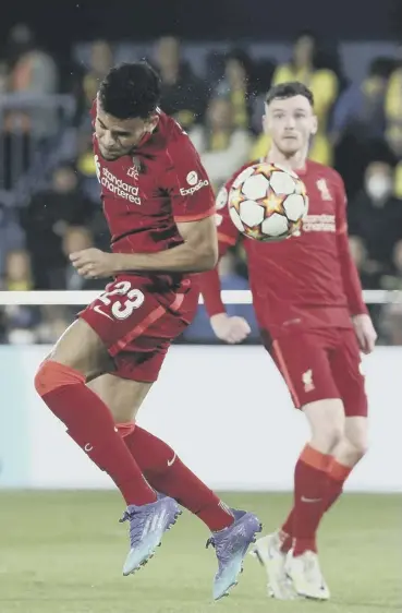  ?? ?? 0 Liverpool’s Andy Robertson looks on as Luis Diaz scores against Villarreal on Tuesday