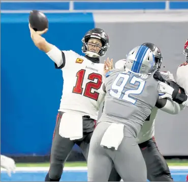  ?? AP ?? Buccaneers quarterbac­k Tom Brady passes during the first half against the Detroit Lions on Saturday in Detroit.