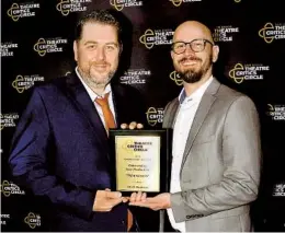  ?? ION MOE ?? CCAE Theatrical­s artistic director J. Scott Lapp (left) and managing producer Jordan Beck hold their Outstandin­g New Production award for “Witnesses.”