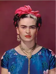  ?? FINE ARTS MUSEUMS OF SAN FRANCISCO ?? Nickolas Muray's 1939 photo “Frida in Blue Dress” is on display at the de Young Museum as part of the “Appearance­s Can Be Deceiving” exhibit.