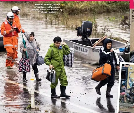  ??  ?? Rescuers come to the aid of residents in Marumori, Miyagi, which was flooded by Typhoon Hagibis.