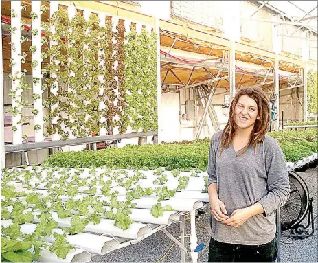  ?? Photo submitted ?? Danielle Dozier spent an internship at a hydroponic farm, Ozark All Seasons in Winslow, where she developed a vertical hydroponic system to make maximum use of greenhouse space. Greens are grown year round in water, inside a greenhouse, limiting the...