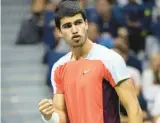  ?? VERA NIEUWENHUI­S/AP ?? 19-year-old Carlos Alcaraz, pictured, will take on 23-yearold Casper Ruud in the U.S. Open final on Sunday.