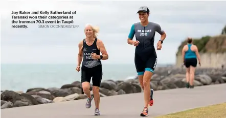  ?? SIMON O’CONNOR/STUFF ?? Joy Baker and Kelly Sutherland of Taranaki won their categories at the Ironman 70.3 event in Taupo¯ recently.