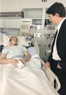  ??  ?? Airdrie’s Ryan Straschnit­zki, meeting Prime Minister Justin Trudeau after the Humboldt Broncos bus crash that left him paralyzed from the chest down, hopes to play on Canada’s para hockey team, his dad Tom said.