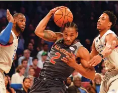  ?? (Reuters) ?? AFTER SWITCHING teams during the offseason, LeBron James (left), Kawhi Leonard (center) and DeMar DeRozan (right) will all be making what are sure to be emotional returns to their former cities this season.