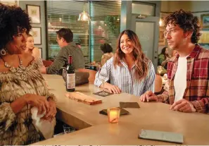  ?? (Lara Solanki/ABC via AP) ?? This image released by ABC shows Gina Rodriguez, center, and Rick Glassman, right, in a scene from "Not Dead Yet."